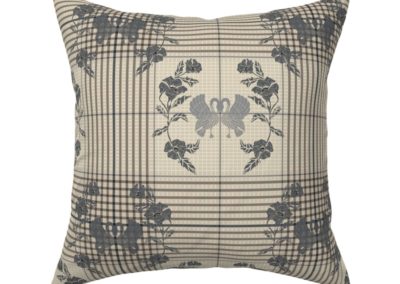 Throw pillow with art nouveau swans bordered by flowers in half drop on a checked pattern. Main color is "silver Cloud" (sand)