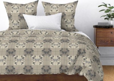 Bedding, duvet and pillow cover with art nouveau swans bordered by flowers in half drop on a checked pattern. Main color is "silver Cloud" (sand)