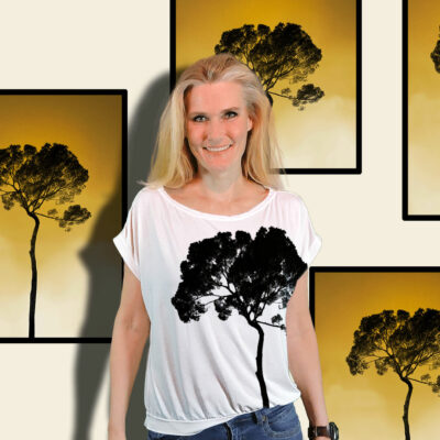"Tree" short sleeved blouse made from mtm fabric 152cm x 1meter. Ejm Art FREE Blouse & Sweater XS-XL Pattern" was used to cut and sew the blouse. Ground color is white and artwork black. In background photo art posters of the same artwork.